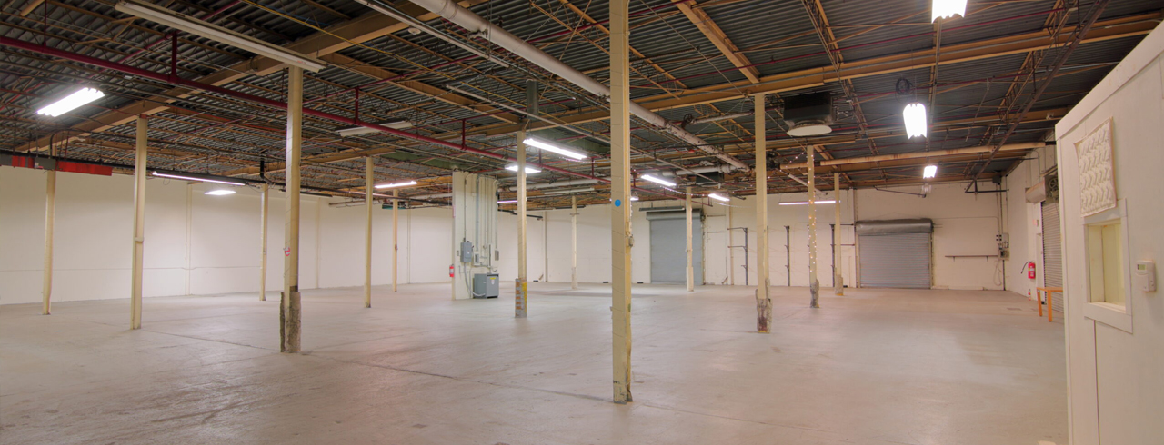 the inside of an empty industrial building