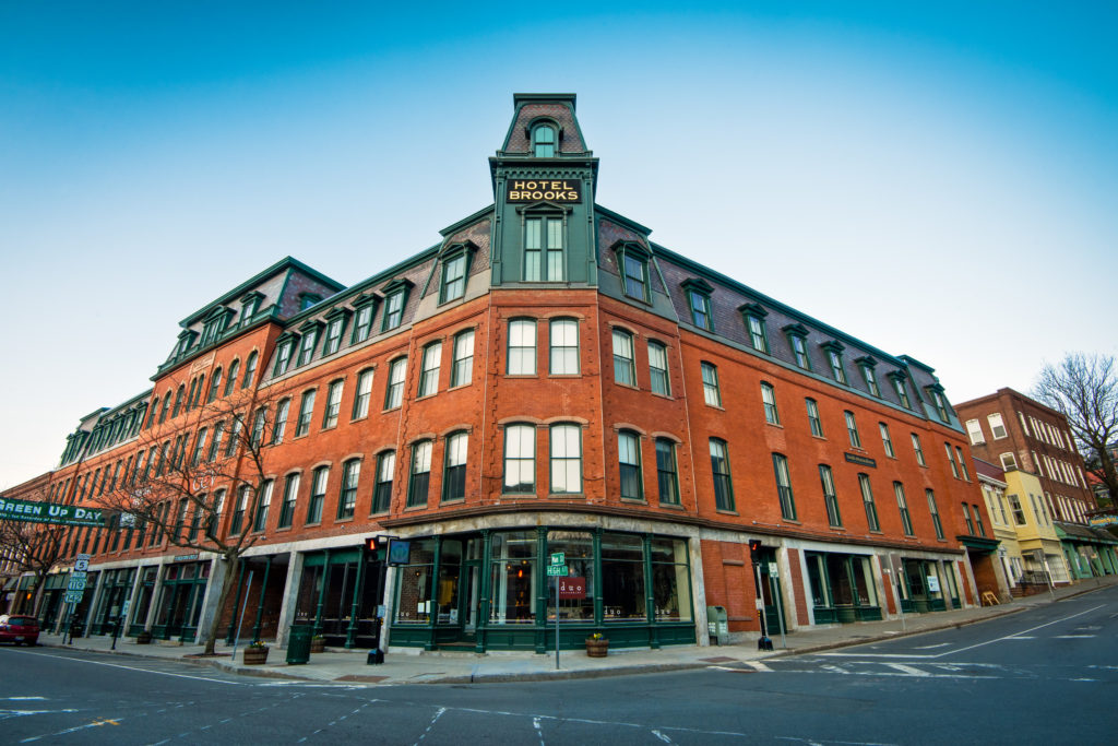 Facade of the corner of a brick victorian commercial building