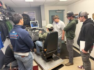 Students using driving simulator