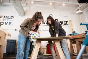 Women using power tools